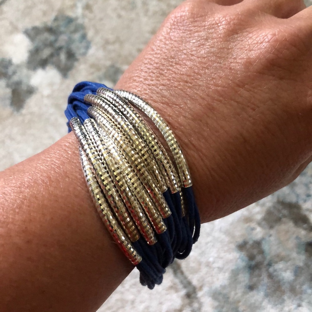 New bright silver liquid metal/ leather bracelet